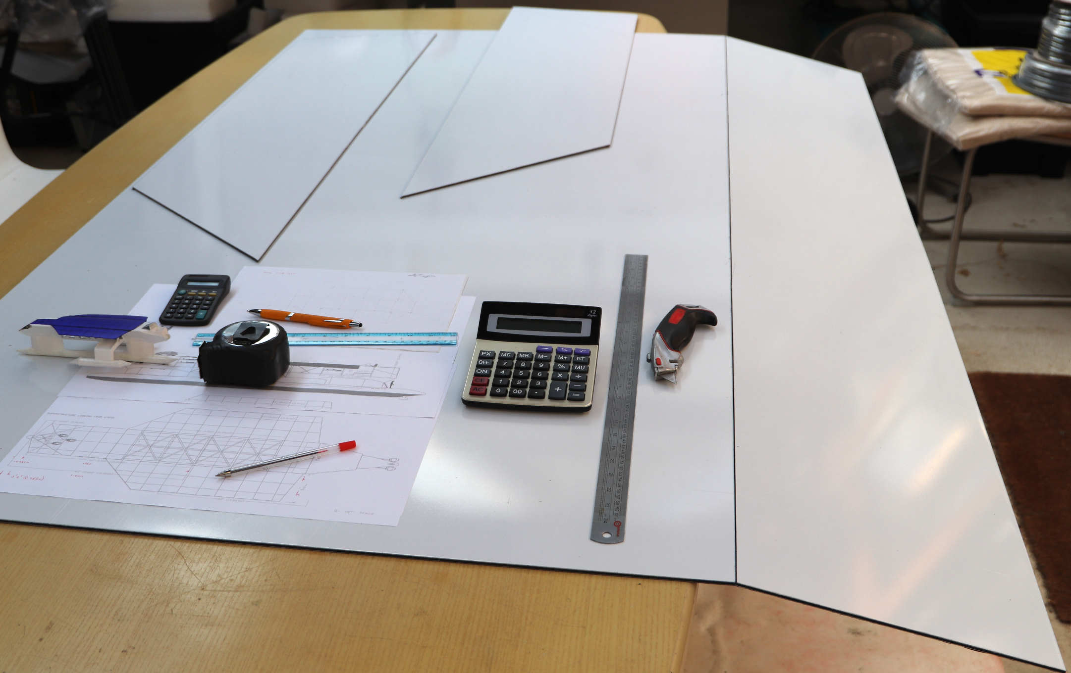 Marking out and cutting the wings for mounting the PV solar panels